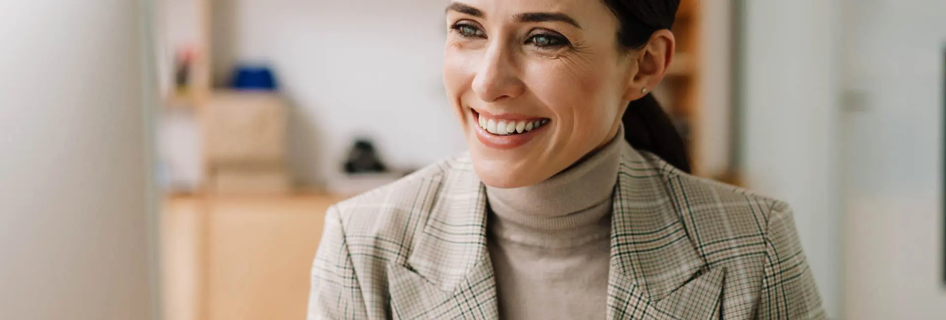 Beautiful woman smiling after Dental Bridges