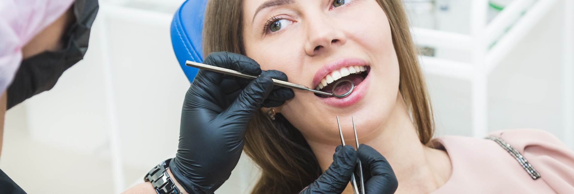 Beautiful woman smiling after Extractions