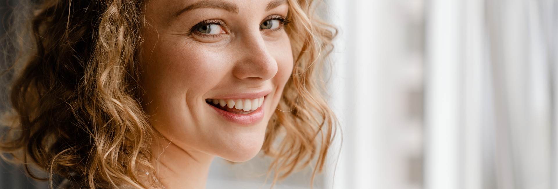 Beautiful woman smiling after Preventative Dentistry