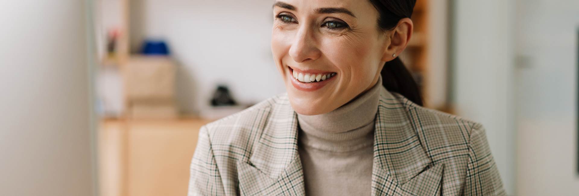 Beautiful woman smiling after Dental Bridges