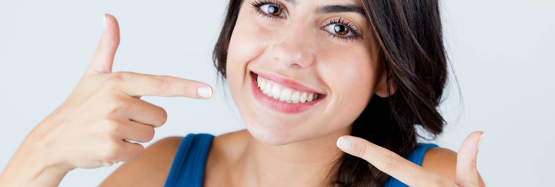 Beautiful woman smiling after Inlays and Onlays