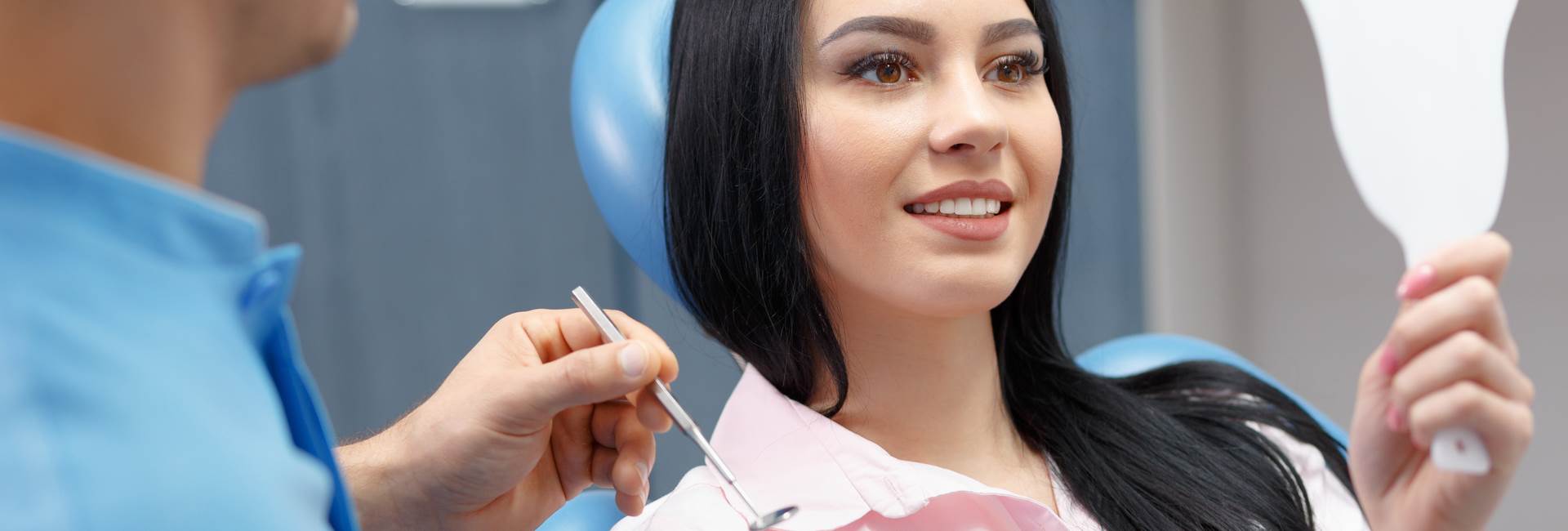 Beautiful woman smiling after Dental implants and grafting