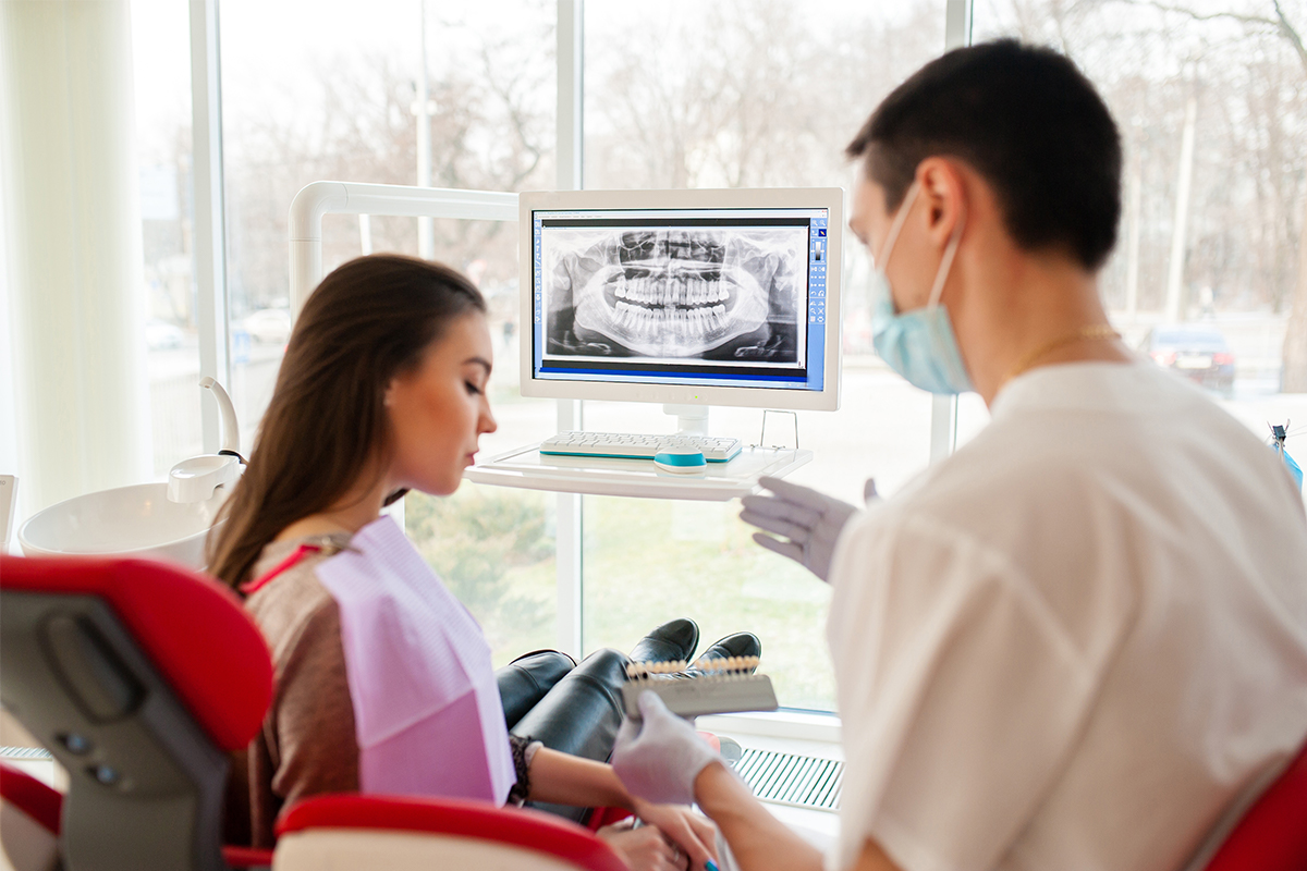 Dentist with patient
