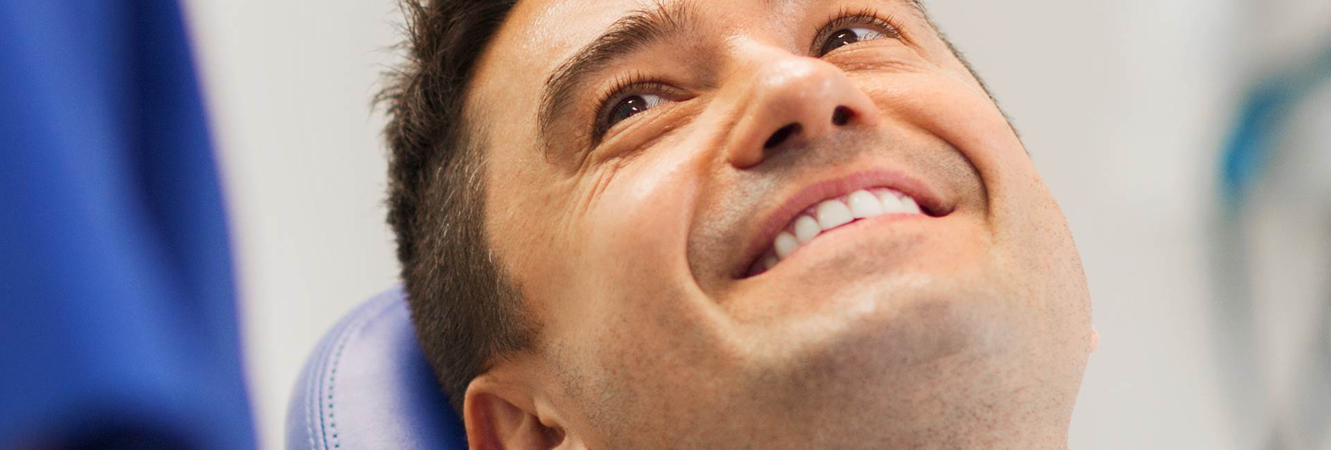 Man smiling after Dental Crowns